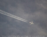 I was outside for a short time this evening with my camera when this plane flew overhead. It's a bit different than my normal shots, but I liked the ghostly appearance it had.