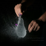 I haven't used my flashes much so I decided it was time to get them out. I also have never done a ballon pop picture, so that makes it my new expereince for this weeks theme. My lovely hand model Mike, convienientlky hiding his scarred up thumb, helped me pop a lot of balloons this evening (I probably should have made my "new experience" not waiting till the last minute). I might have to try this again with bigger balloons. These tiny water balloons pop so quickly that it was hard to even get the ballon remnants in the shot. #water #pop #balloon #freezemotion #52frames #52project #52frames_anewexperience #flash